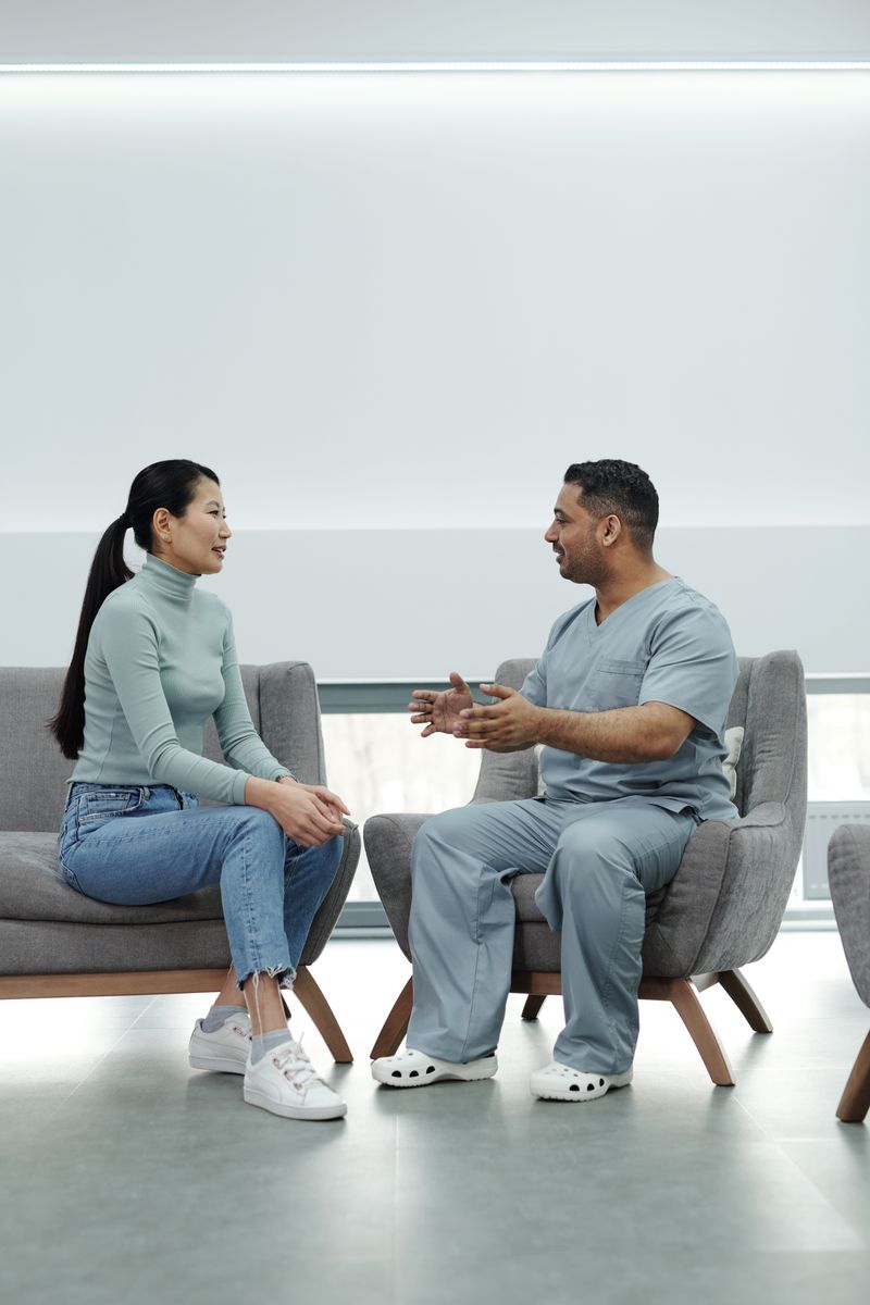 A doctor consulting patiently with a family